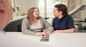 NDIS participant in therapy session with allied health professional — Coffs Harbour disability support